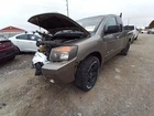 Titan 2007 Rear View Mirror 11382529 Used. Price: $46.02.