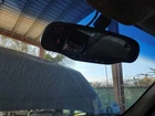 2003 Gmc Envoy Oem Automatic Dimming Rear View Mirror With Compass And Onstar Used. Price: $96.65.
