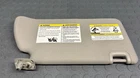 2013-21 Nissan Frontier Driver Left Sun Visor Gray W/o Illumination Oem Used. Price: $112.00.