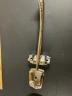 4886909--1963/64-CADILLAC Mirror Inside Support Bracket Used. Price: $37.50.