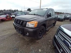 Titan 2012 Rear View Mirror 11888577 Used. Price: $71.02.